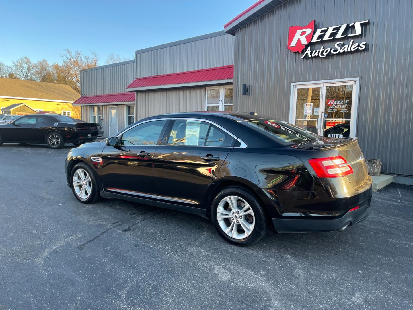 2013 Black /Black Ford Taurus SEL FWD (1FAHP2E85DG) with an 3.5L V6 DOHC 24V engine, 6-Speed Automatic transmission, located at 547 E. Main St., Orwell, OH, 44076, (440) 437-5893, 41.535435, -80.847855 - Photo#11